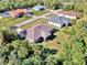 Aerial view showcasing house and neighborhood setting at 1858 Capitol St, North Port, FL 34288