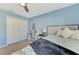 Bright bedroom with double doors and a comfortable bed at 1858 Capitol St, North Port, FL 34288