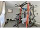Home gym with various exercise equipment including a weight machine at 1858 Capitol St, North Port, FL 34288