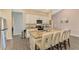 Bright kitchen featuring granite island and stainless steel appliances at 1858 Capitol St, North Port, FL 34288