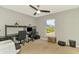 Home office with two desks, shelving, and a large window at 1858 Capitol St, North Port, FL 34288