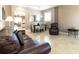 Bright dining area with a chandelier and a view into the kitchen at 24488 Riverfront Dr, Punta Gorda, FL 33980