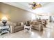 Living room with a view into the kitchen area at 24488 Riverfront Dr, Punta Gorda, FL 33980