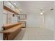 Kitchen with light-colored cabinets and breakfast bar at 3041 Clifford St, Punta Gorda, FL 33980