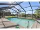 Screened-in pool with canal view at 3041 Clifford St, Punta Gorda, FL 33980