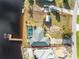 Aerial view of waterfront home with pool and dock at 3220 Peace River Dr, Punta Gorda, FL 33983