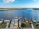 Waterfront home with an expansive lawn and dock with water access at 3220 Peace River Dr, Punta Gorda, FL 33983
