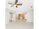 Spacious Gathering room with tile floors and kitchen views at 3220 Peace River Dr, Punta Gorda, FL 33983