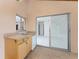 Convenient wet bar with sink and access to interior at 3220 Peace River Dr, Punta Gorda, FL 33983