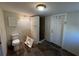 Bathroom with toilet and shower, undergoing renovation at 4525 Church St, Punta Gorda, FL 33980