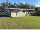 Rear view of house with additional exterior features at 4525 Church St, Punta Gorda, FL 33980