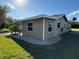 Side view of the house showing additional windows at 4525 Church St, Punta Gorda, FL 33980