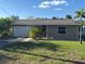 Newly renovated home with a large yard and attached garage at 4525 Church St, Punta Gorda, FL 33980