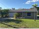 Newly renovated home with attached garage and landscaping at 4525 Church St, Punta Gorda, FL 33980