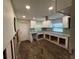 Renovated kitchen with white shaker cabinets and granite countertops at 4525 Church St, Punta Gorda, FL 33980