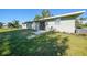 House exterior showcasing a well-maintained lawn at 511 Corto Andra St, Punta Gorda, FL 33950