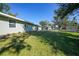 Backyard with lush green grass at 511 Corto Andra St, Punta Gorda, FL 33950