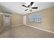 Spacious bedroom with tile flooring and a ceiling fan at 511 Corto Andra St, Punta Gorda, FL 33950