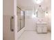 Clean bathroom with shower/tub combo and vintage vanity at 515 W Olympia Ave, Punta Gorda, FL 33950