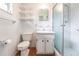 Clean bathroom with shower, toilet, and vanity at 515 W Olympia Ave, Punta Gorda, FL 33950