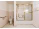 Bathroom with shower, tub, and grab bars at 515 W Olympia Ave, Punta Gorda, FL 33950