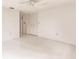 Large bedroom with closet and access to hallway at 515 W Olympia Ave, Punta Gorda, FL 33950