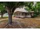 Charming single story home with mature landscaping and a spacious front yard at 515 W Olympia Ave, Punta Gorda, FL 33950