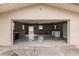 Open garage with ample space for vehicles and storage at 515 W Olympia Ave, Punta Gorda, FL 33950