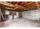 Attached garage with washer, dryer, and storage at 515 W Olympia Ave, Punta Gorda, FL 33950