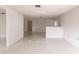Spacious living area with terrazzo floors and an open layout at 515 W Olympia Ave, Punta Gorda, FL 33950