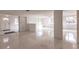 Bright and airy living room with a view of the entryway and other rooms at 515 W Olympia Ave, Punta Gorda, FL 33950