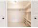 Spacious walk-in closet with built-in shelving at 515 W Olympia Ave, Punta Gorda, FL 33950