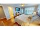Cozy bedroom with hardwood floors, plantation shutters and coastal decor at 1 Colony Point Dr # 16C, Punta Gorda, FL 33950