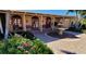 Community courtyard with fountain, benches, and lush landscaping at 1 Colony Point Dr # 16C, Punta Gorda, FL 33950