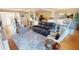 Well-lit living room with open layout and plenty of natural light and seating at 1 Colony Point Dr # 16C, Punta Gorda, FL 33950