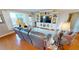 Comfortable living room with large windows that provide lots of light and a great water view at 1 Colony Point Dr # 16C, Punta Gorda, FL 33950