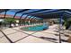 Enjoy this sparkling outdoor pool with plenty of lounge chairs and a screened overhead to provide shade at 1 Colony Point Dr # 16C, Punta Gorda, FL 33950