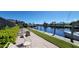 Community waterfront area with seating and access to the waterway at 1 Colony Point Dr # 16C, Punta Gorda, FL 33950