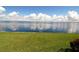 Scenic view of calm water under a cloudy sky at 1 Colony Point Dr # 16C, Punta Gorda, FL 33950