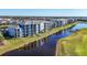 Aerial view of community with lake and golf course at 14061 Heritage Landing Blvd # 415, Punta Gorda, FL 33955