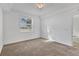 Spacious bedroom with neutral carpeting and large window at 14061 Heritage Landing Blvd # 415, Punta Gorda, FL 33955