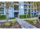 Well-maintained building with lush landscaping at 14061 Heritage Landing Blvd # 415, Punta Gorda, FL 33955