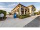 Exterior view of clubhouse with landscaping at 14061 Heritage Landing Blvd # 415, Punta Gorda, FL 33955