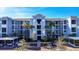 Luxury apartment building with covered parking and landscaping at 14061 Heritage Landing Blvd # 415, Punta Gorda, FL 33955
