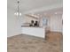 Open kitchen with granite countertops and stainless steel appliances at 14061 Heritage Landing Blvd # 415, Punta Gorda, FL 33955
