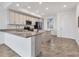 Modern kitchen featuring granite counters and stainless steel appliances at 14061 Heritage Landing Blvd # 415, Punta Gorda, FL 33955