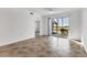 Bright living room with tile floors and access to patio at 14061 Heritage Landing Blvd # 415, Punta Gorda, FL 33955