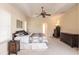 Main bedroom with king-size bed, ample space and window seating at 17347 Lake Worth Blvd, Port Charlotte, FL 33948