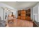 Bright living room with hardwood floors and built-in shelving at 18749 Ackerman Ave, Port Charlotte, FL 33948