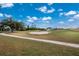 Scenic golf course view with sand trap and lush green fairways at 26138 Stillwater Circle, Punta Gorda, FL 33955